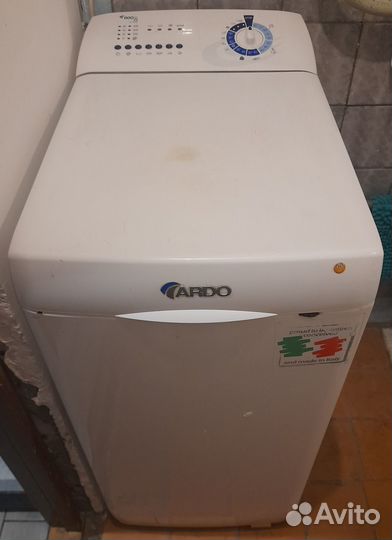 Стиральная машинка с вертикальной загрузкой