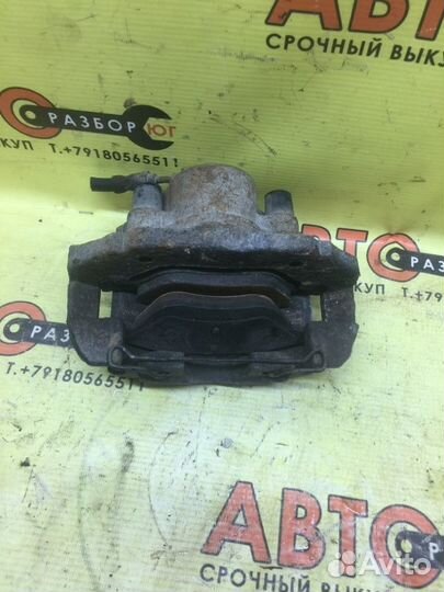 Суппорт передний левый Mazda Demio DY DY3W 2003