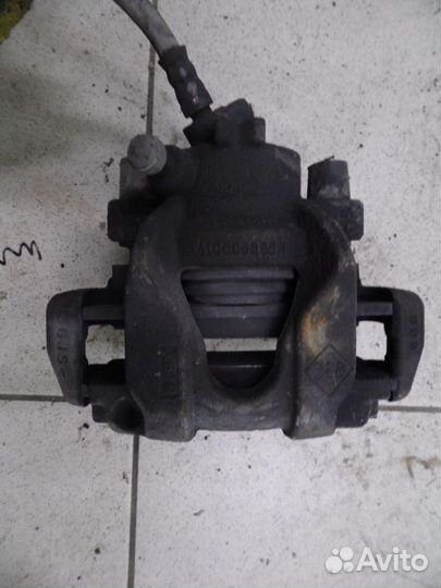 Суппорт тормозной передний правый Renault Sandero