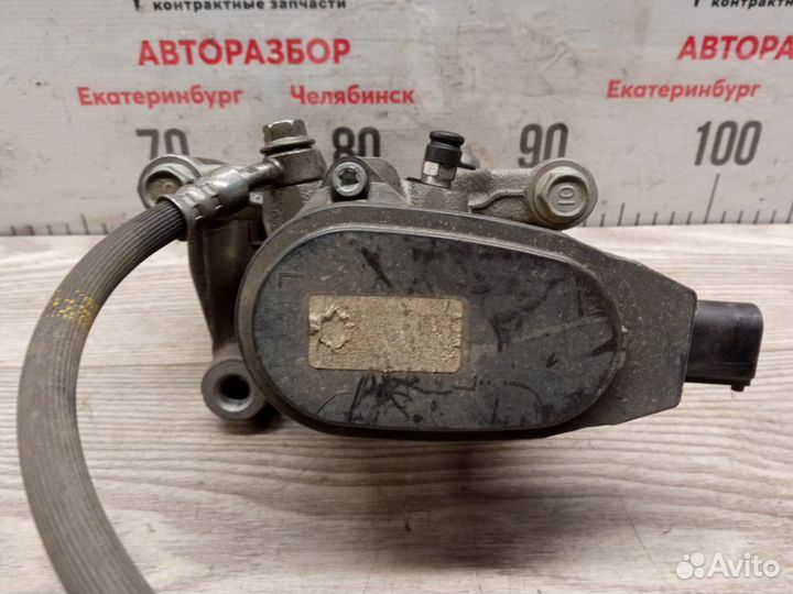 Суппорт тормозной задний левый Kia Sportage QL