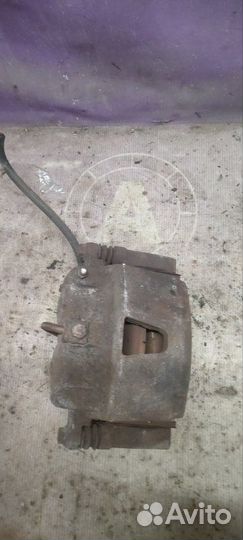 Суппорт тормозной передний правый Jeep Grand