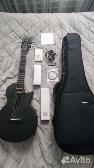 Продам трансакустическую гитару enya nova go
