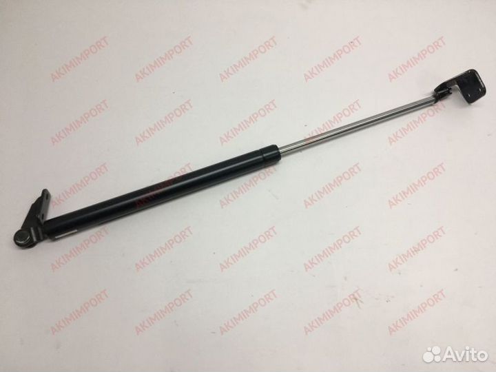 Амортизатор двери задней левый