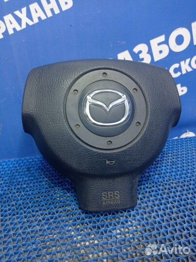 Подушка безопасности водителя Mazda Demio 2