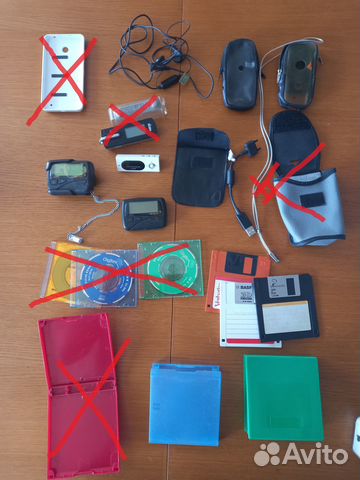 Ассорти,чехлы,пейджеры,провода,дискеты,диски и пр