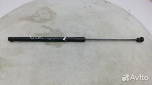 Амортизатор капота opel astra H (91H24D701)