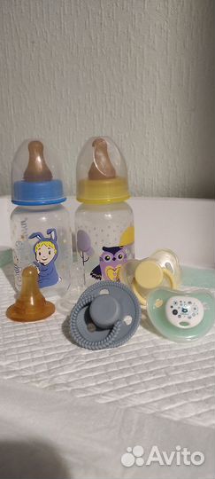 Бутылочки и пустышки