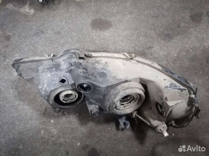 Фара левая Opel Astra G