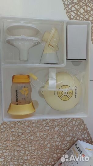 Молокоотсос medela swing flex электрический