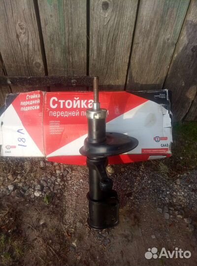 Стойка амортизатора передняя правая ваз калина