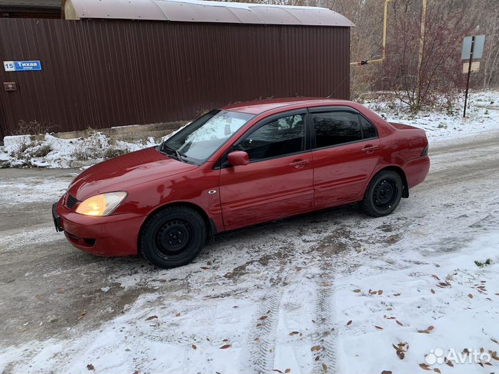 Mitsubishi Lancer 1.6 МТ, 2006, 301 000 км