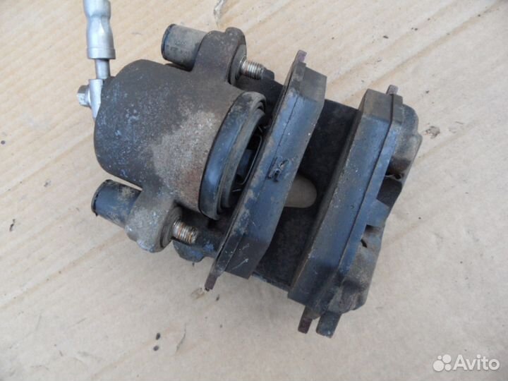 Суппорт тормозной передний Шкода Октавия А5