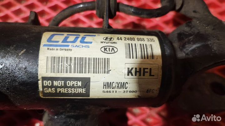 Стойка амортизатора переднего левого Kia Quoris