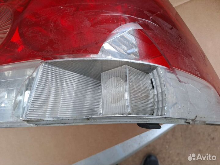 Задний фонарь opel astra h седан