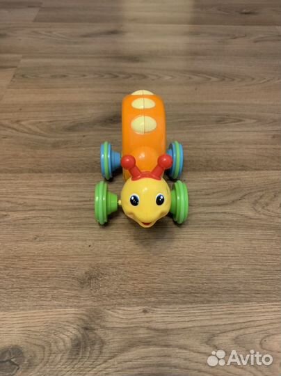 Улитка каталка игрушка механическая