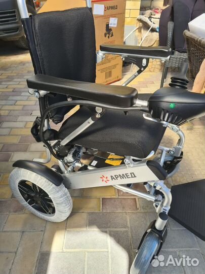 Новая инвалидная коляска с электроприводом