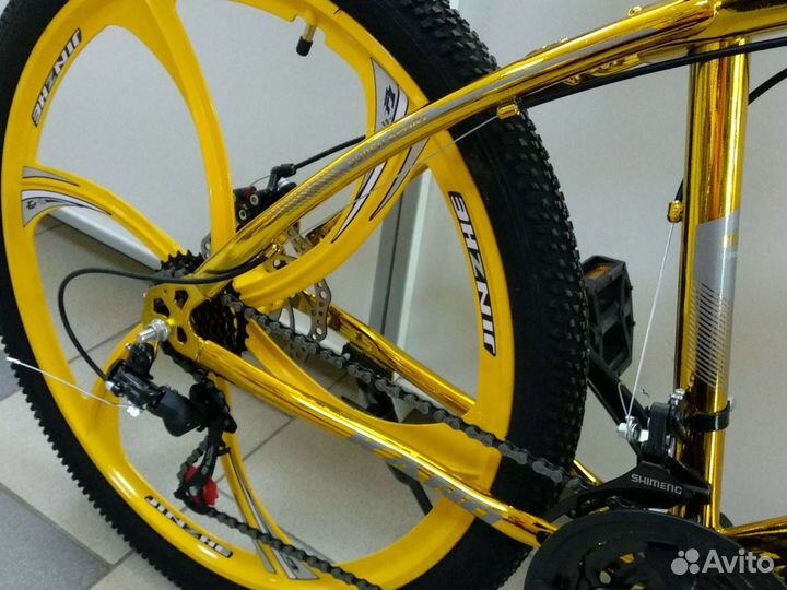 Велосипед на дисках золотой