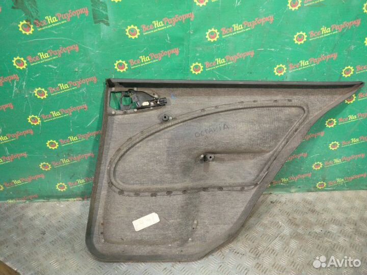 Обшивка двери задней левой Skoda Octavia