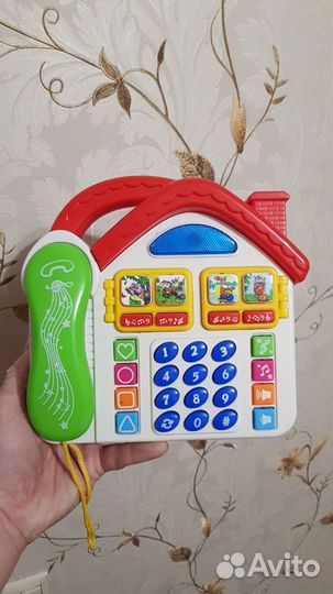 Телефон игрушечный с музыкой и сказками