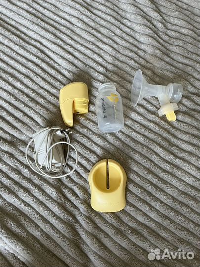 Молокоотсос medela электрический