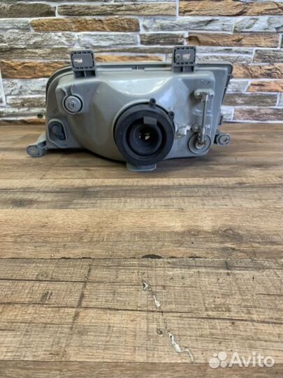 Фара Kia Sportage I