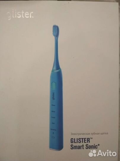 Электрическая зубная щетка