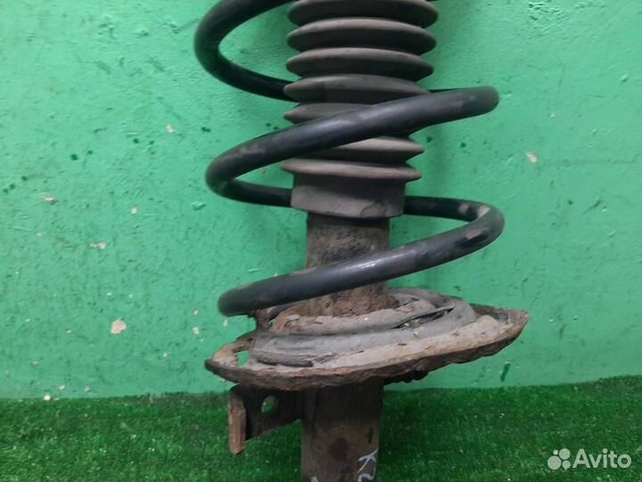 Стойка амортизатора передняя левая Renault Megane