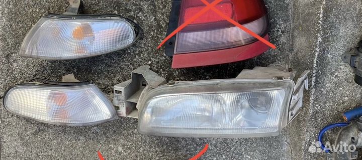 Фара левая mazda 626 GE