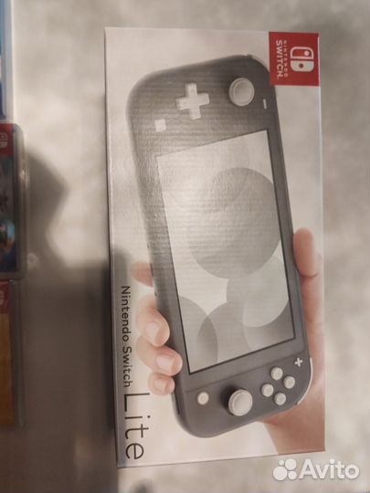 Nintendo Switch lite+картриджи и коллекционка