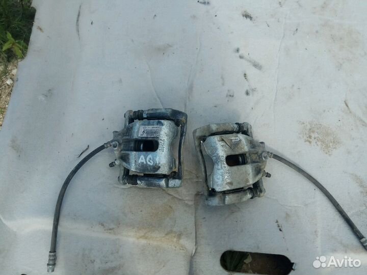 Супорт передний Nissan Almera G15