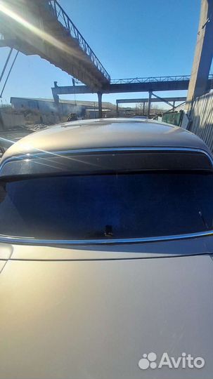 Стекло заднее волга 31105