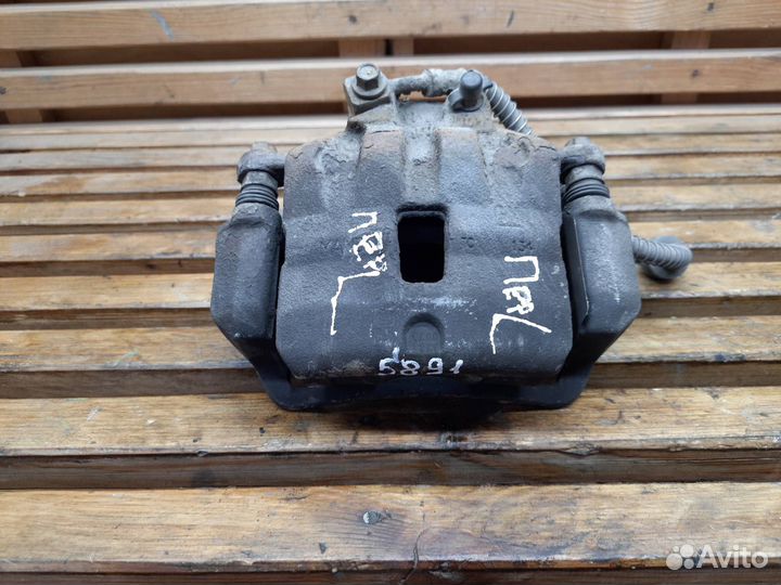 Суппорт тормозной передний левый Opel Astra J 2012