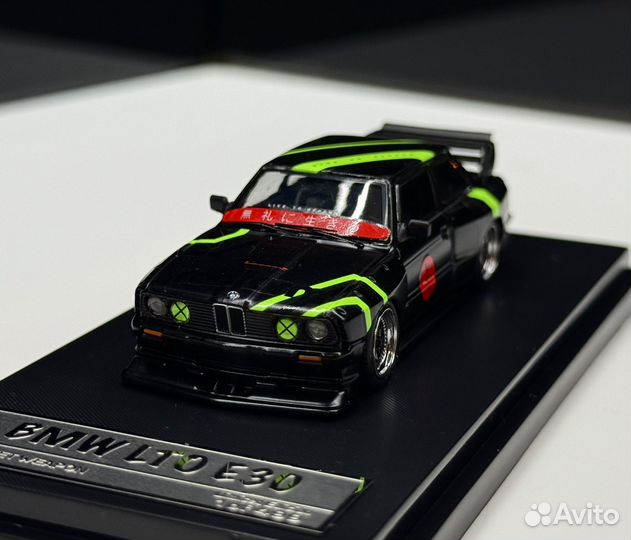 Модель BMW LTO E30 street weapon 1:64