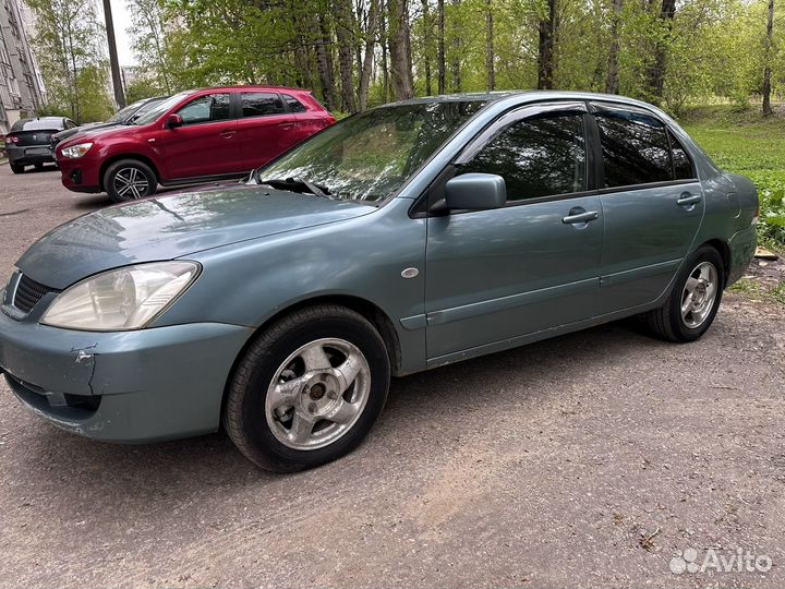Mitsubishi Lancer 1.6 МТ, 2006, 245 000 км