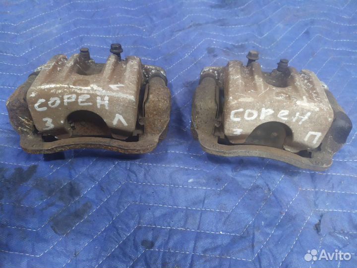 Суппорт задний Kia Sorento 2 XM Santa Fe 2 CM