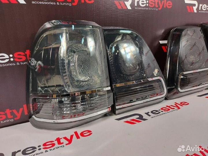 Стопы Toyota Land Cruiser 100 дымчатые S1826