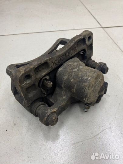 Суппорт тормозной задний левый Chevrolet Captiva