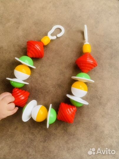 Растяжка в коляску погрямушка