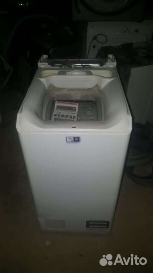 Стиральная машинка с вертикальной загрузкой