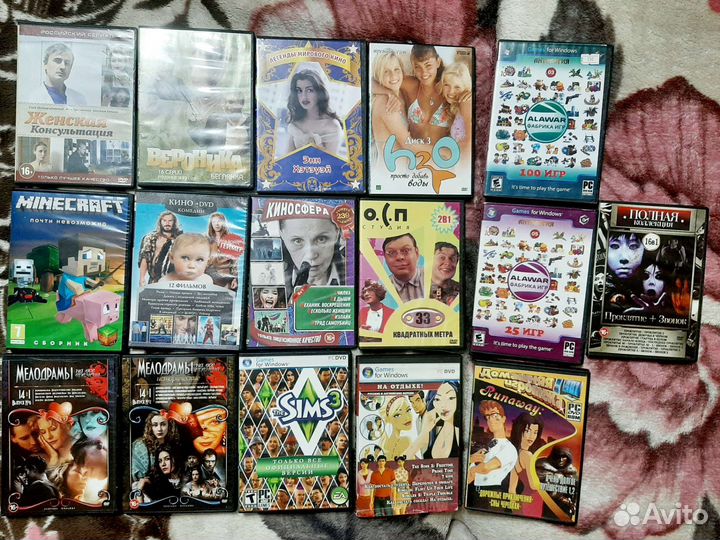 Диски с фильмами, играми, мультиками много