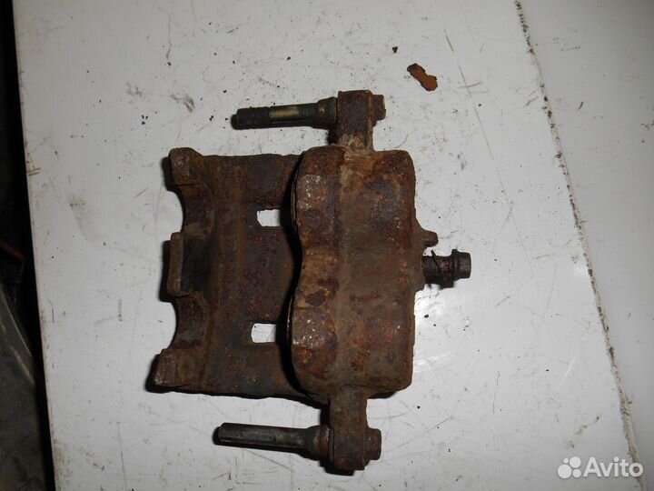 Суппорт передний левый Kia Sorento Киа Соренто