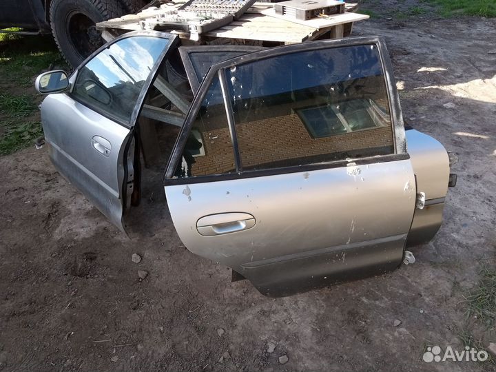 Двери на митсубиси