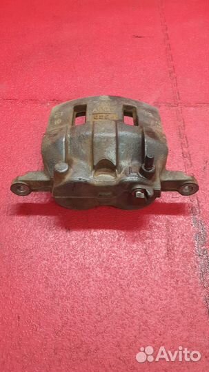 Суппорт тормозной передний левый isuzu NMR 85 E5