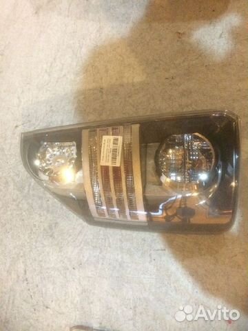 Фонарь (стоп сигнал) задний левый 28-199 левый Toy