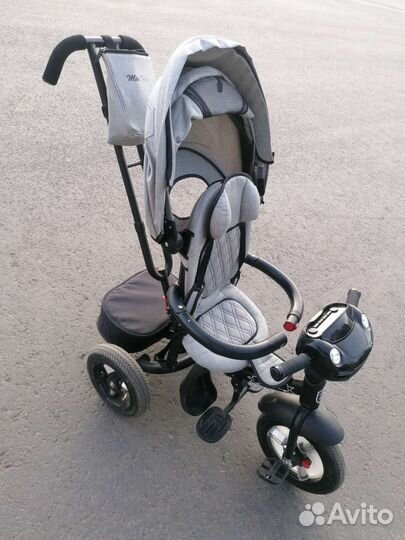 Трехколесный велосипед с ручкой