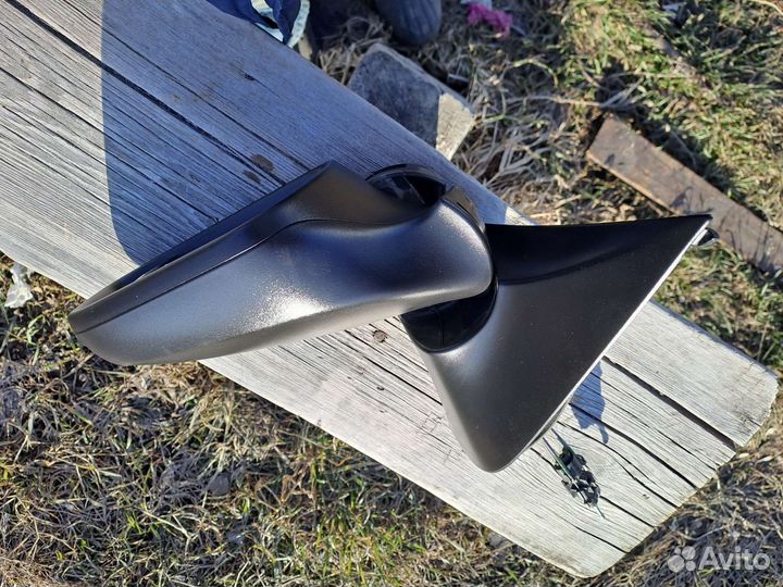 Левое зеркало заднего вида на Опель астра н