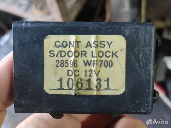 Блок управления дверьми Ниссан Либерти