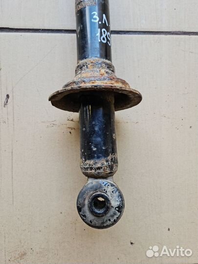 Стойка амортизатор задний Mitsubishi Lancer IX