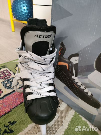 Коньки хоккейные action