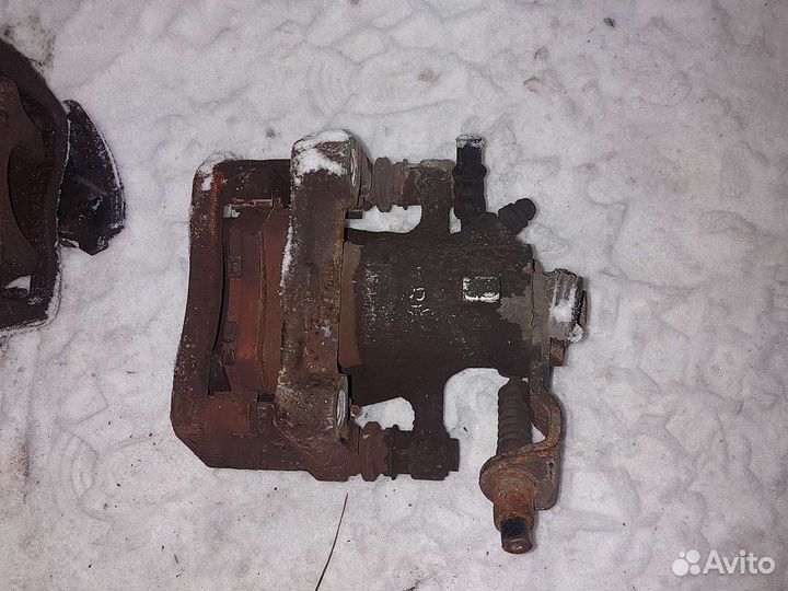 Суппорт тормозной задний Опель Астра Н